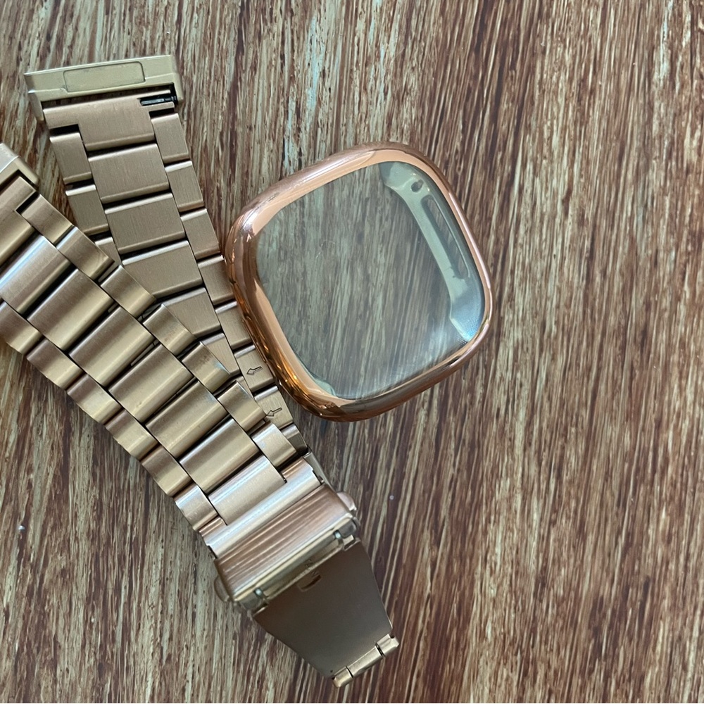 Rose gold Fitbit versa 3 band and watch cover